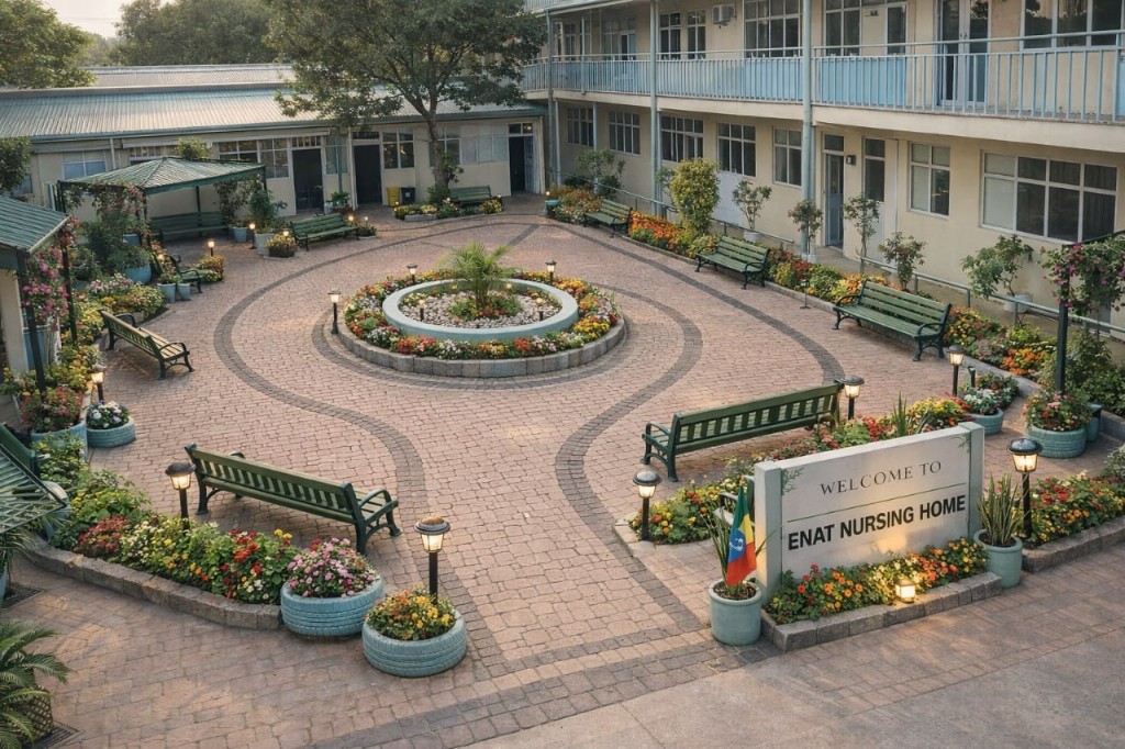 Outdoor courtyard at Enat Nursing Home with welcome sign, landscaped garden, seating, and facility building in Addis Ababa